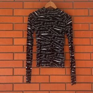 FREE PEOPLE  Movement Black High Jump Printed Logo Long Sleeve Top Size XS